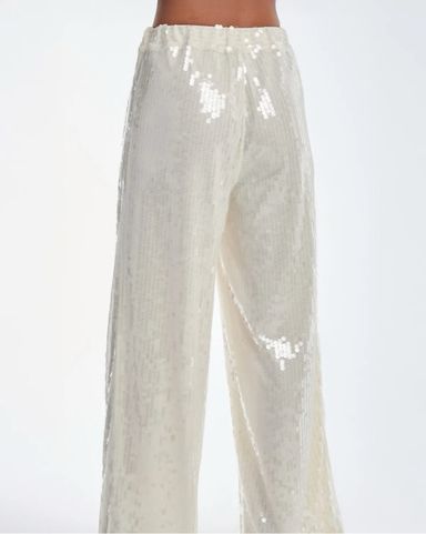 【Norma Kamali】 Sequinedワイドレッグパンツ Sequined wide-leg pants in white - Norma Kamali | Mytheresa